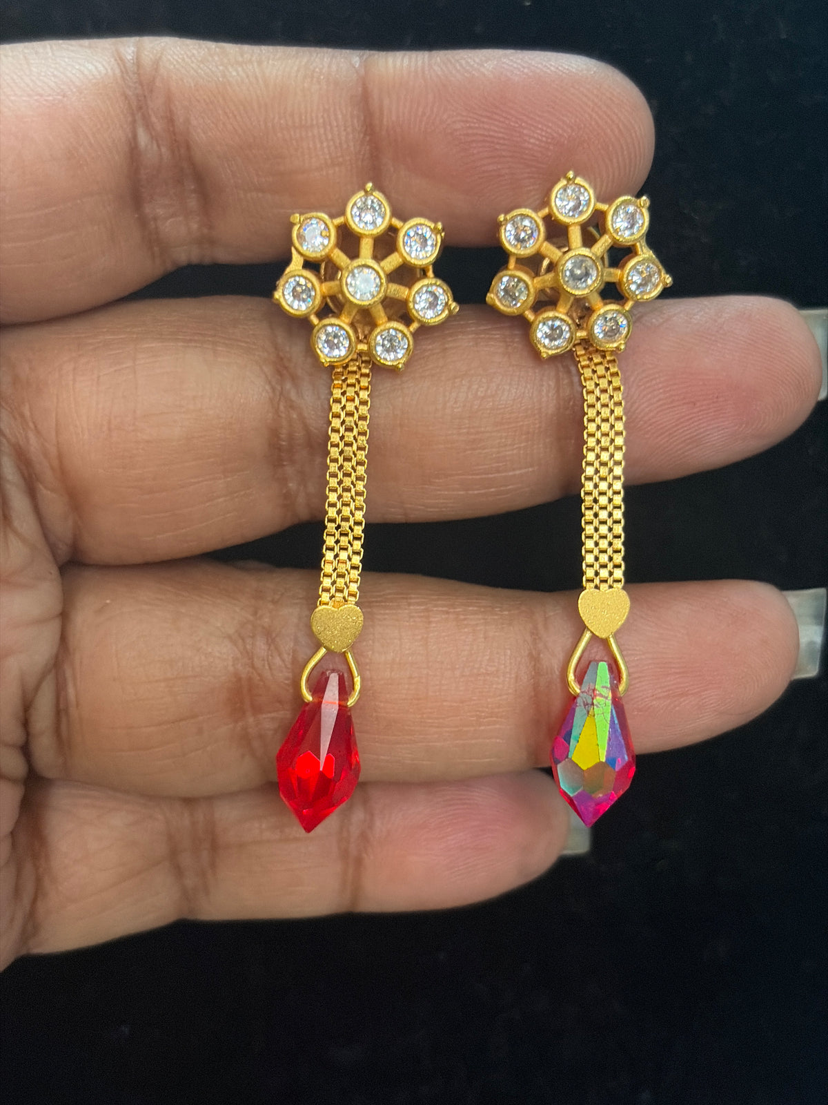 046, titanic Impon with gold polish earring